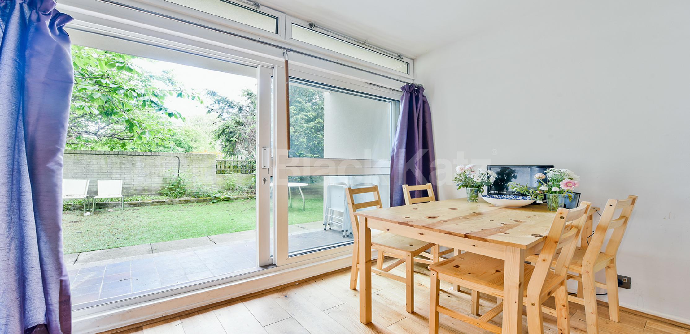 Arranged over two floors with tranquil garden Cedars Road, Clapham Common North Side
